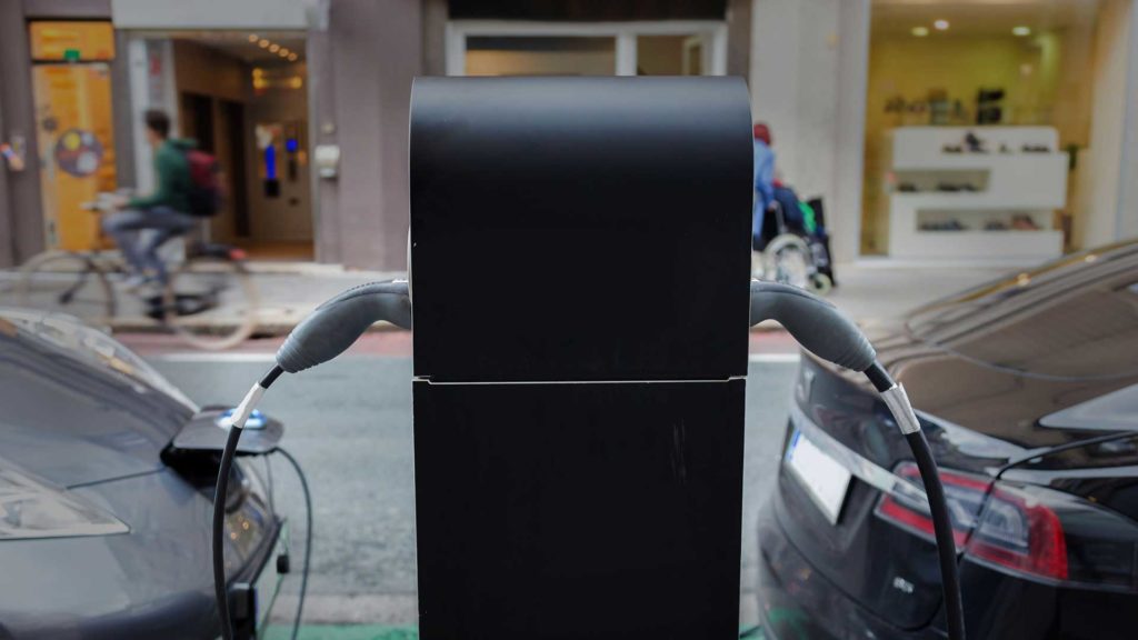 bigstock-Electric-Car-in-Charging-Stati-79190779-2